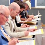 Religious-scholars-signing-an-appeal-requesting-an-end-to-Chairman-Lees-detention-696x464